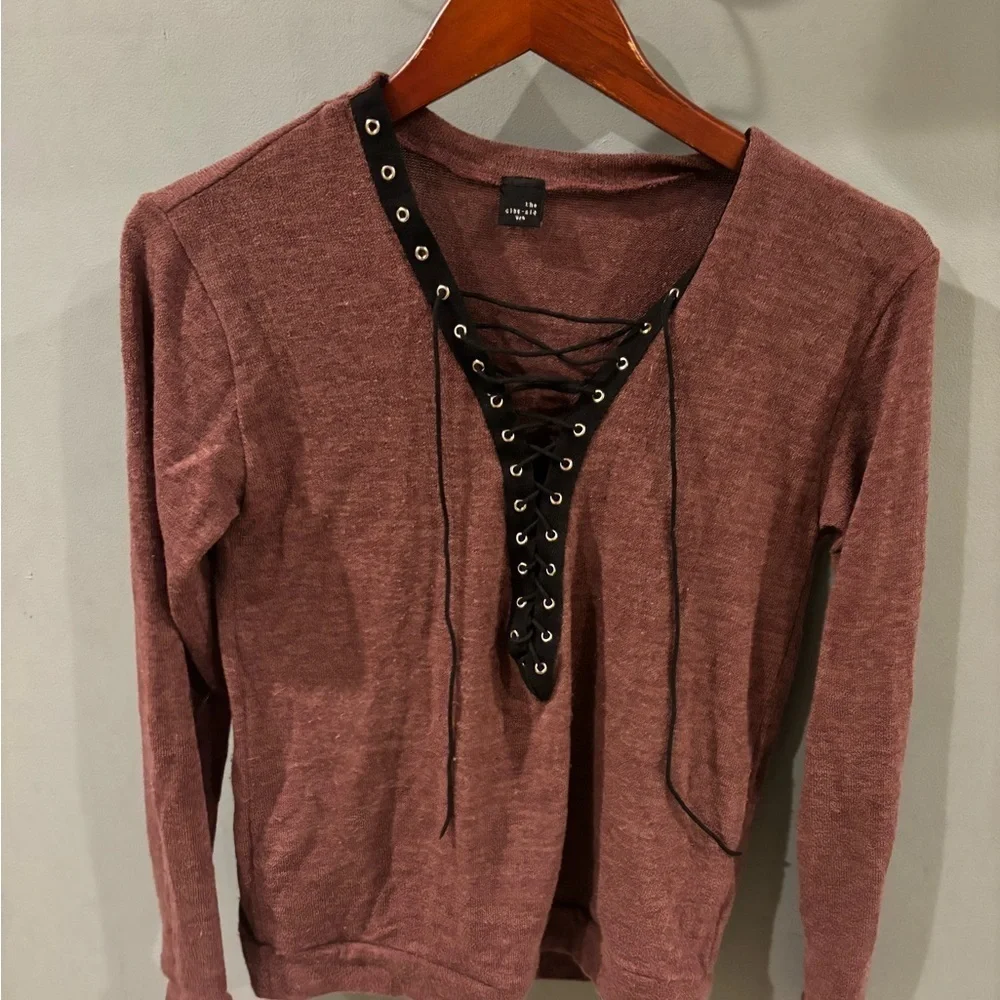 The classic USA lace up sweater size small